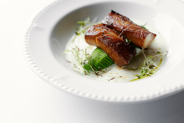 eel baked and laid on avocado