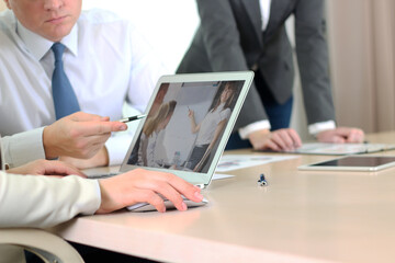 Fototapeta premium Online remote business presentation is on a laptop in the office