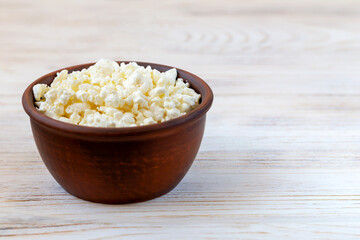 Fresh delicious white cottage cheese in a bowl