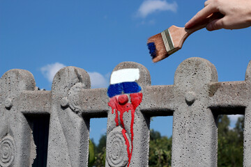 Painting   fence with Russia  flag's color. Stop War in the Ukraine.