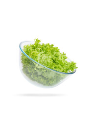 green salad leaves in a glass bowl