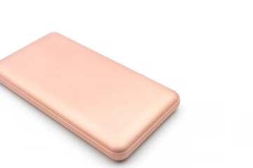 Pink power bank on white background
