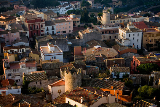 Narrow streets and old buildings in Begur, Spain.