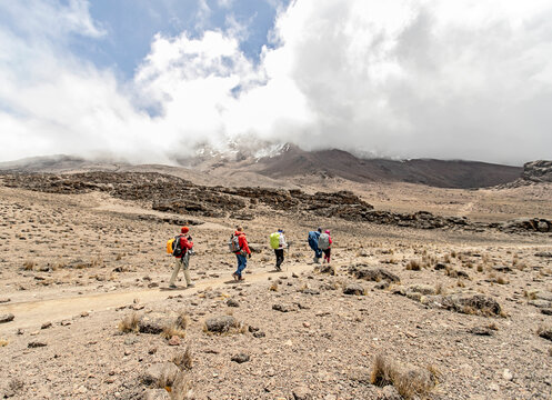 Hikers in desert on Mount Kilimanjaro, Tanzania
