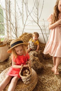 Children at Easter with rabbits and ducks