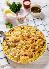 macaroni bake with shrimps, mussels, fish, leek