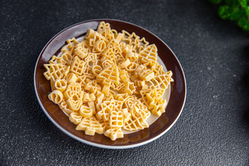 pasta christmas shape festive food spruce, star, santa, snowman delicious snack healthy meal food snack on the table copy space food background rustic top view