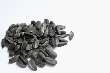 Heap of Sunflower Seeds on a white background.