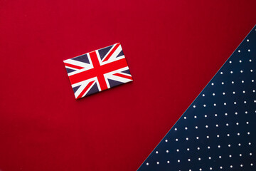 Abstract flat lay backdrop, the Union Jack on red and blue polka dot background, perfect for...