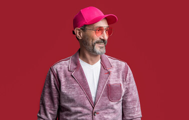 mature stylish man wearing cap in studio. mature man wear stylish jacket.