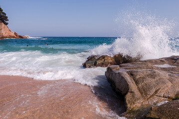 Huge waves crash against the rocks at Fenals Beach in Lloret de Mar. Catalonia