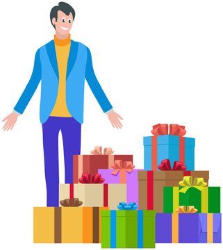 Happy shopper young male person with lot of gifts for family or friends. Seasonal holiday sales, discounts, black friday or cyber monday. Smiling man stands at pile of boxes with ribbons and bows