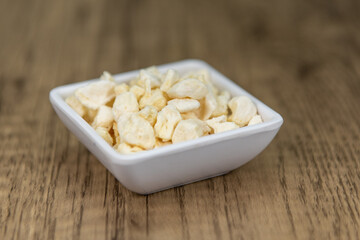 Freeze dried dehydrated pineapple chunks can be ground up and added to a drink for a vitamin C boost