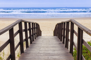 Fototapeta premium wooden walkway to the beach