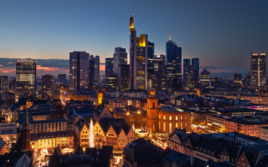 Fototapeta na wymiar Illuminated City Skyline at Night in Frankfurt am main, Germany