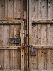 Old, picturesque main front door in mediterranean region house