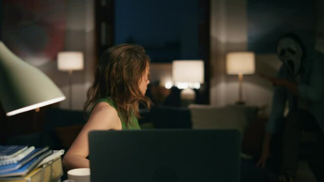Stressed woman scared laptop screen at room closeup. Man frighting working wife