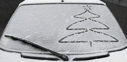 Christmas tree drawing in the snow