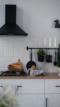 Video of a modern kitchen, the camera slides to the side