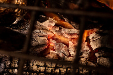 metal grill on wood set on fire