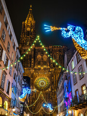 Christmas decorations in the streets of Strasbourg, the capital of Christmas. Christmas market. - obrazy, fototapety, plakaty