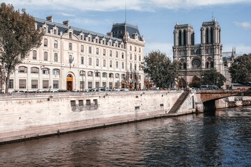 Notre Dame de Paris cathedral next to the Hotel Dieu Hospital above the river Seine in Paris, France