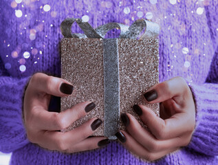 Close up of sparkling golden gift box