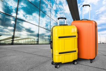 Classic travel Suitcases on Airport background