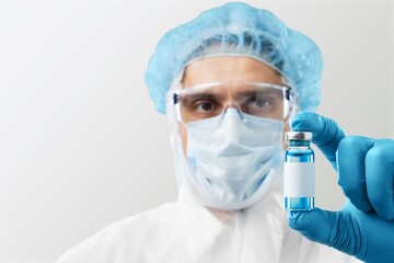 A doctor medical worker hold a vaccine