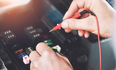 Check voltage with a multimeter tester in car