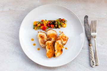 Healthy food grill chicken sweet pepper eggplant in white plate on wood background.