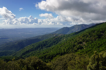 Fototapeta na wymiar Mountains in Corsica, blue sky and green forests, panorama, landscape, Montagnes en Corse, ciel bleu, forets, paysage