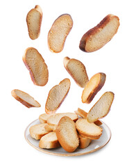 Hard chuck crackers falling into plate on white background