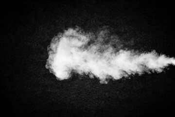 Abstract white smoke or steam in dark