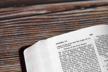 Vision of four beasts, biblical prophecy verses in Holy Bible Book, prophet Daniel 7. A closeup. © Marinela