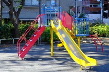 colorful slide in playground of city park