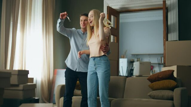 Man buy apartment wife making surprise. Woman rejoicing moving in new house