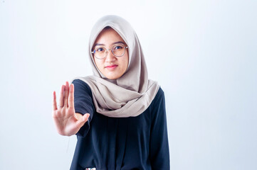 Portrait of beautiful asian woman showing rejection gesture