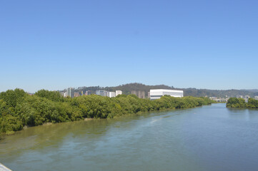 Fototapeta na wymiar the city of concepcion and the biobio river in chile in the summer season with blue sky