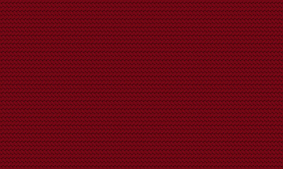 Texture of red knitted fabric. Cozy red knitting pattern