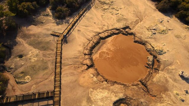 Drone over Volcanic Lake mud pools. Geyser in geothermal volcanic park, New Zealand. drone.