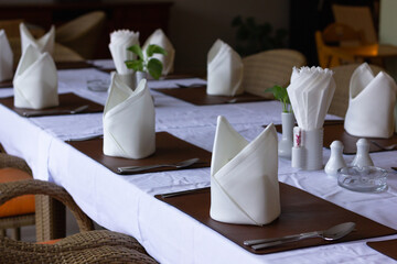 Table setting for wedding at fancy restaurant. Ceremony, special event concept