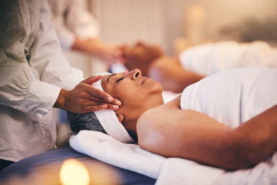 Spa, Massage And Head Of Senior Woman While On Table To Relax For Calm, Peace And Zen Time With A Therapist For Health And Wellness. Patient Get Facial With Cosmetics, Skincare And Detox Treatment