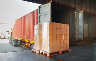 Packaging Boxes Wrapped Plastic on Pallets Loading into Cargo Container. Distribution Supplies Warehouse. Shipping Trucks. Supply Chain Shipment Boxes. Freight Truck Logistics Cargo Transport.	
