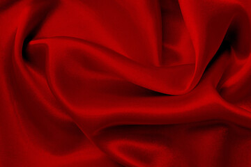 Dark red fabric texture background, detail of silk or linen pattern.