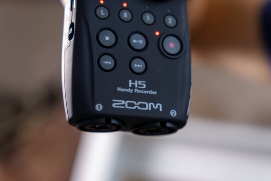 Tyumen, Russia-November 12, 2022: Zoom H5 recorder on a wooden background. Selective focus