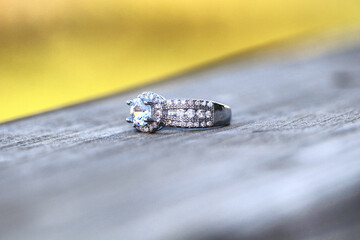 Engagement Ring on Wood Table