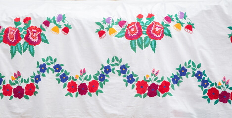 Traditional Slavic vintage vyivka. Ethnic floral Ukrainian or Belarusian pattern on fabric.