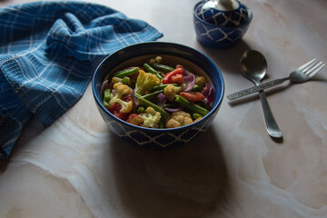 Mixed vegetable steamed in a bowl. Close up, selective focus.