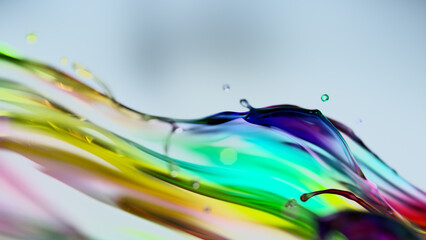 colorful water splash on light blue background, 3D rendering